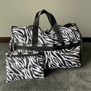 LeSportsac Weekender travel bag in Zebra print, with removable makeup pouch.